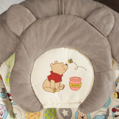 Bright Starts Disney Baby Winnie The Pooh Baby Bouncer Soothing Vibrations Deluxe Infant Seat - Faux Suede, Music, Removable -Toy Bar, 0-6 Months 6-20 lbs (Dots & Hunny Pots)
